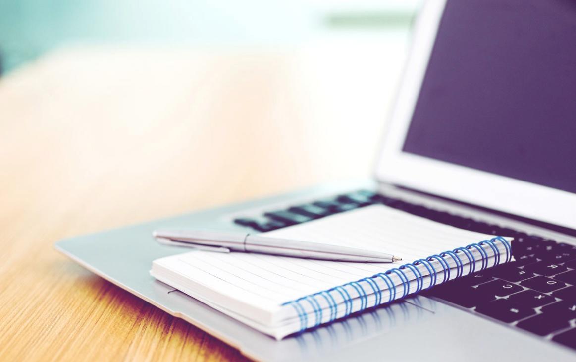 Strategic business planning session with financial documentation and analysis tools